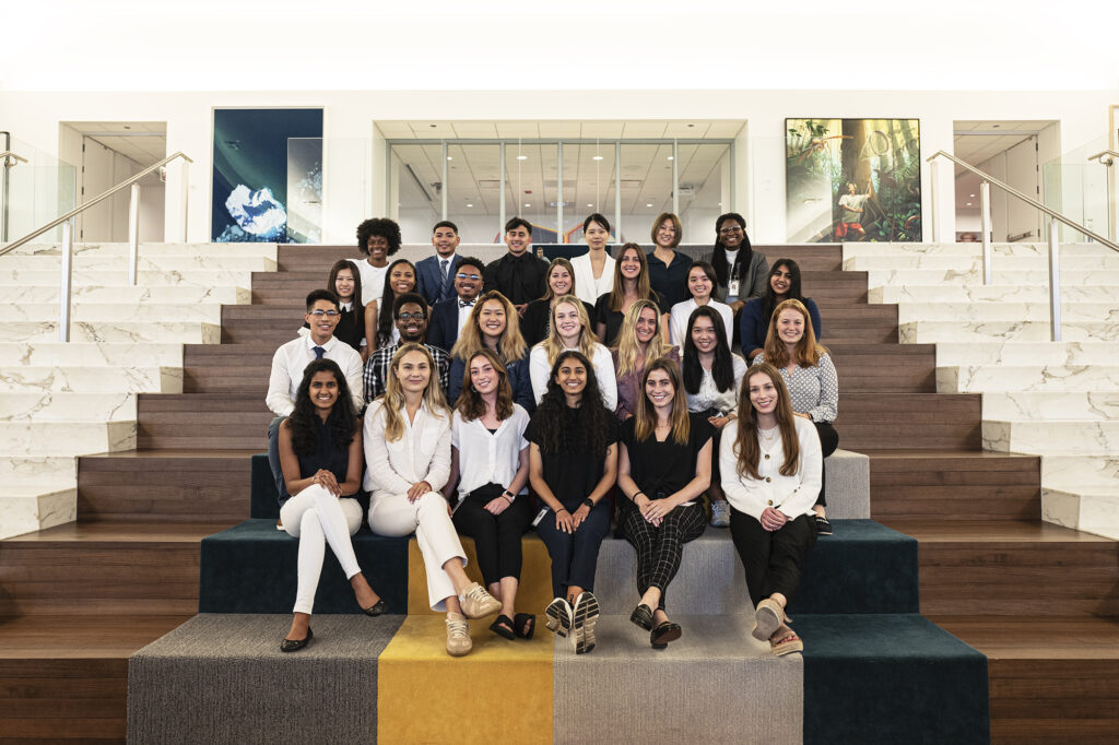 A group of smiling PEAK6 interns.